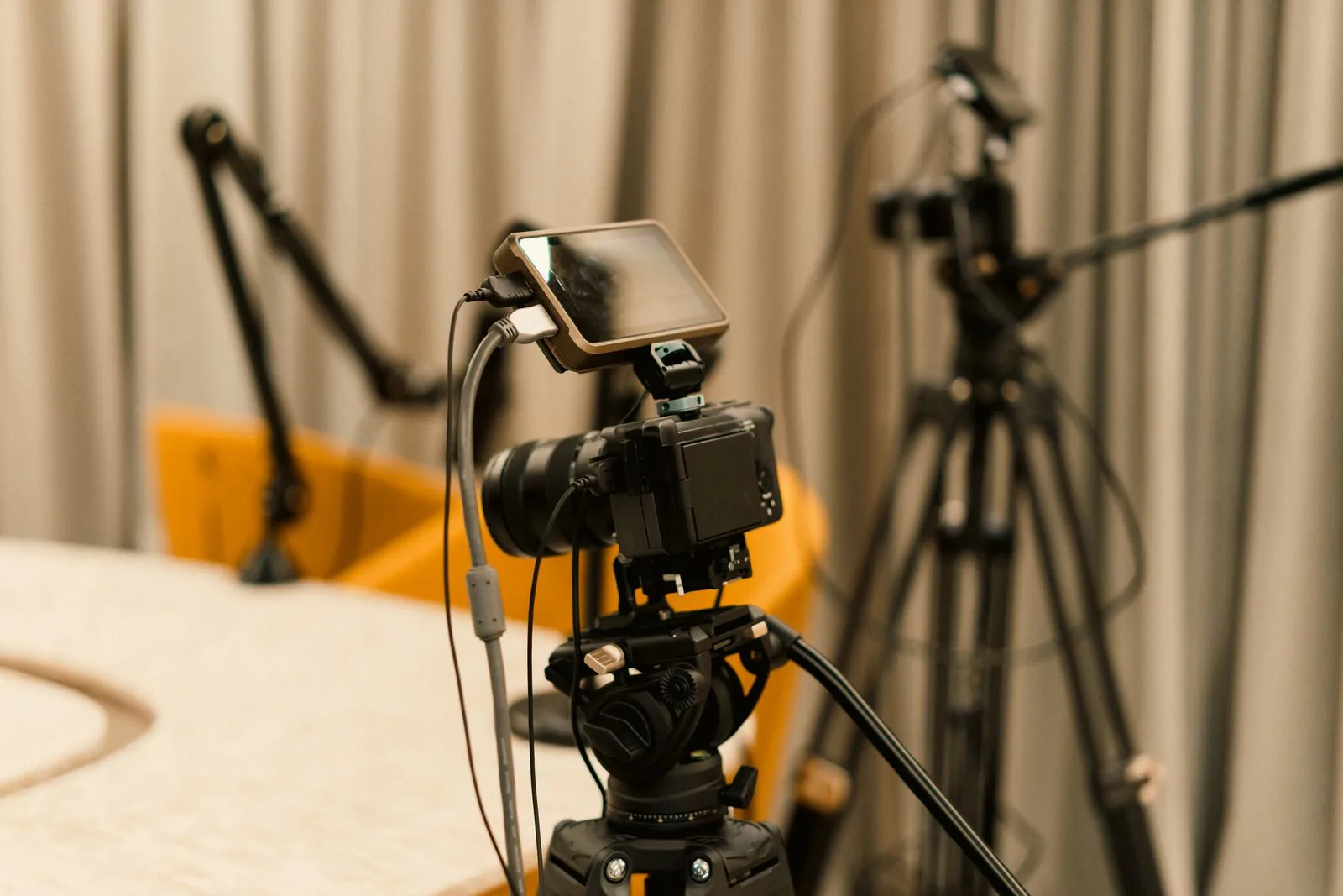 Video camera and microphones in a content recording studio